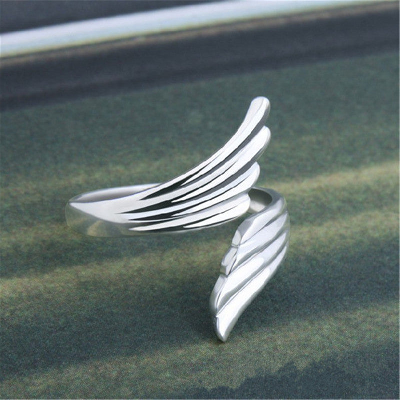 Angel wings lady index finger