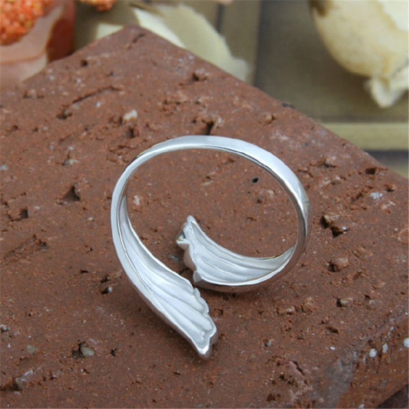 Angel wings lady index finger
