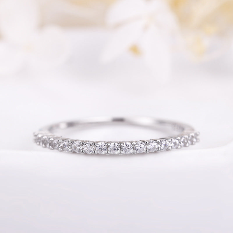 Single row diamond zircon ring
