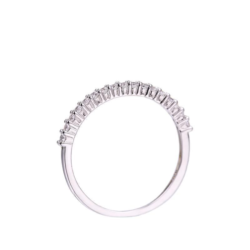 Single row diamond zircon ring