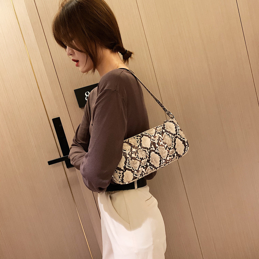 Snake print female bag baguette